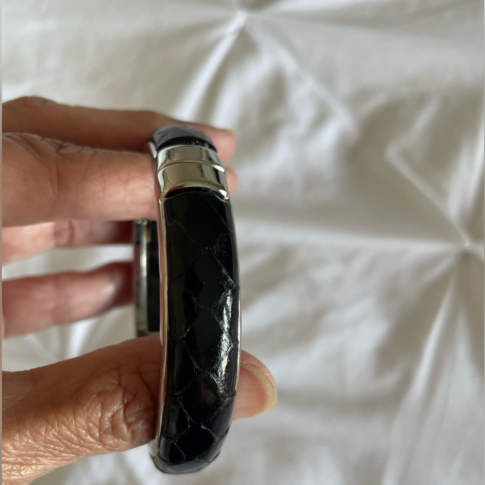 Bangle bracelet made in Italy. Black Croc leather inlay silver tone hardware.
